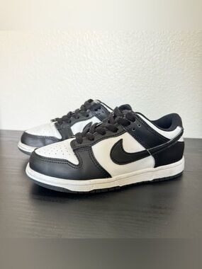 Children’s Nike Dunk Low black and white tennis shoes
